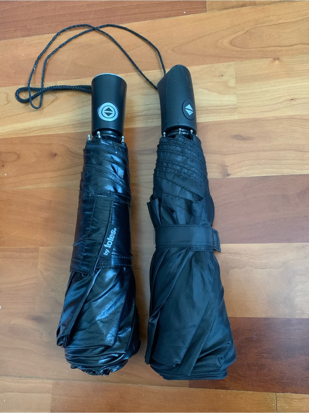 Two Black Compact Folding Umbrellas